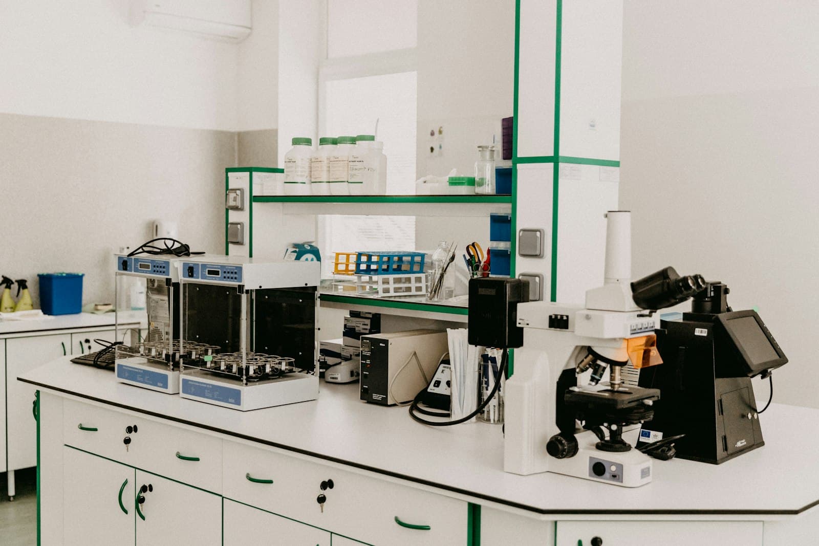 Bright laboratory with analytical equipment and a microscope
